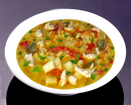 Куриный суп с пшеном и паприкой в тарелке
