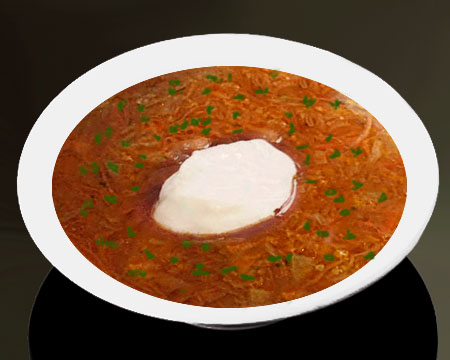 Овощной суп с пшеном и капустой в тарелке