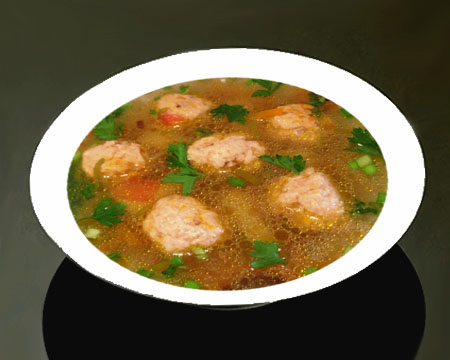 Рыбный суп с фрикадельками в тарелке