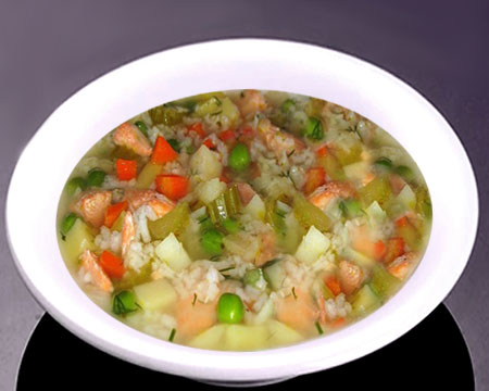 Рыбный суп с рисом и зеленым горошком в тарелке