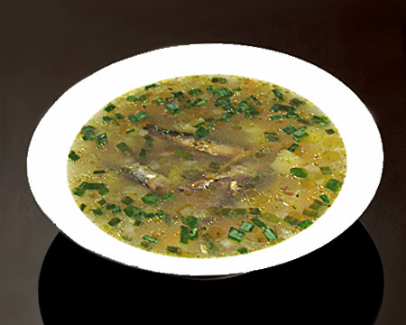 Рыбный суп из шпрот в тарелке