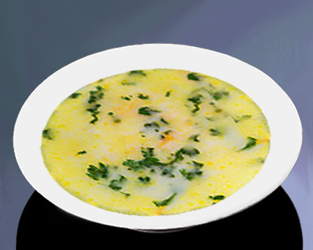 Сырный суп с кабачками в тарелке